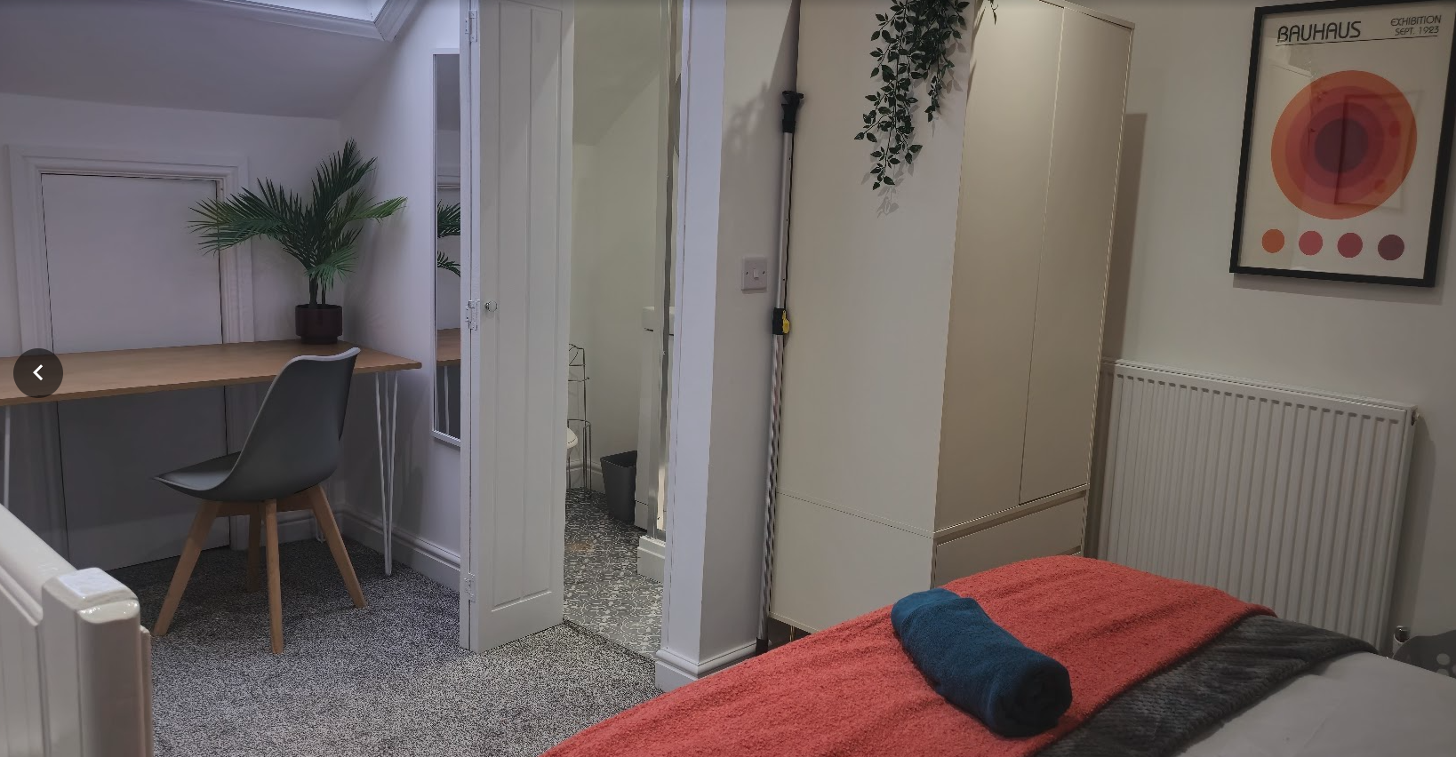 Sheffield after — loft room with desk and en-suite