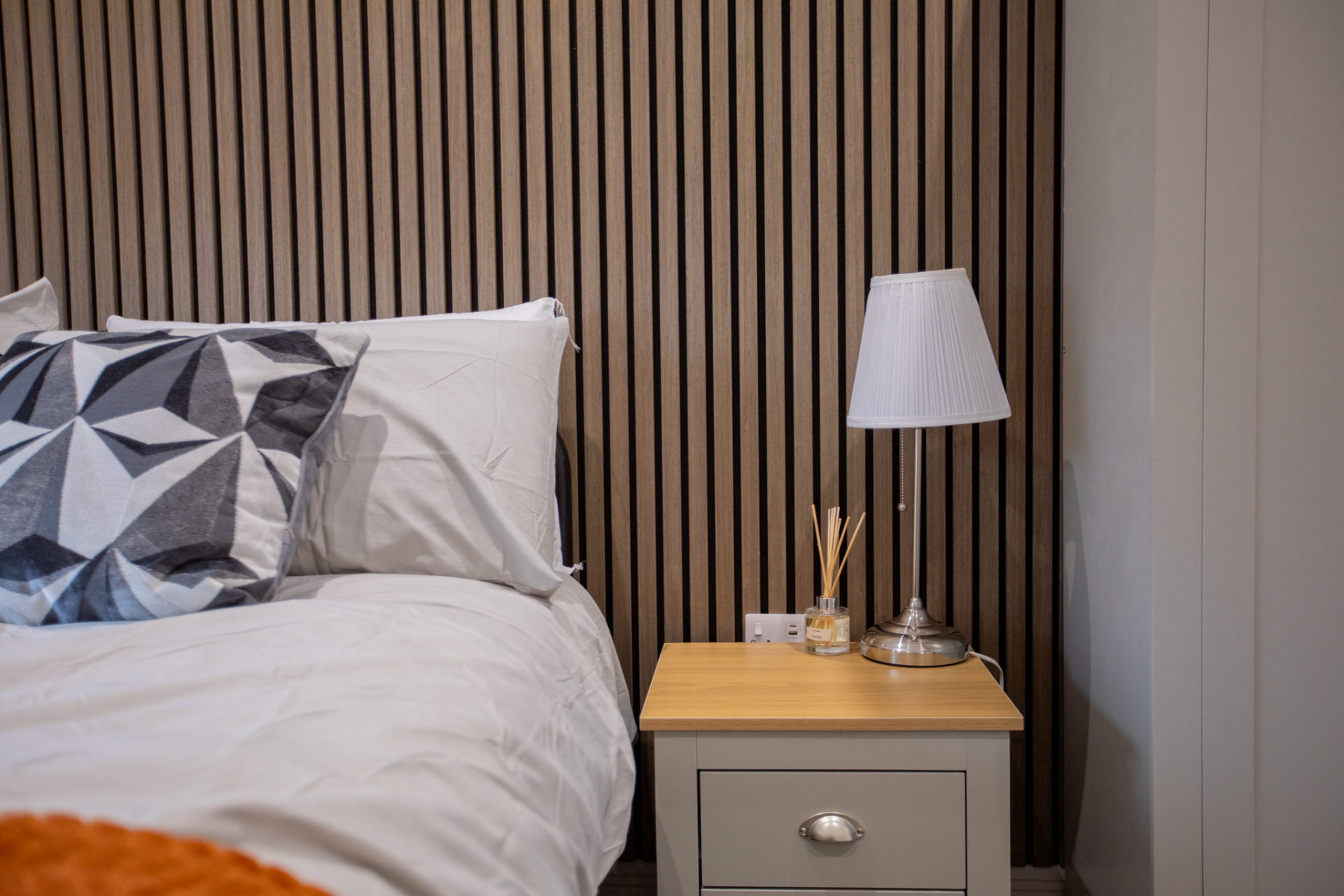 Fairham after — bedside detail with slat panelling
